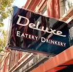 La' Deluxe Eatery company logo